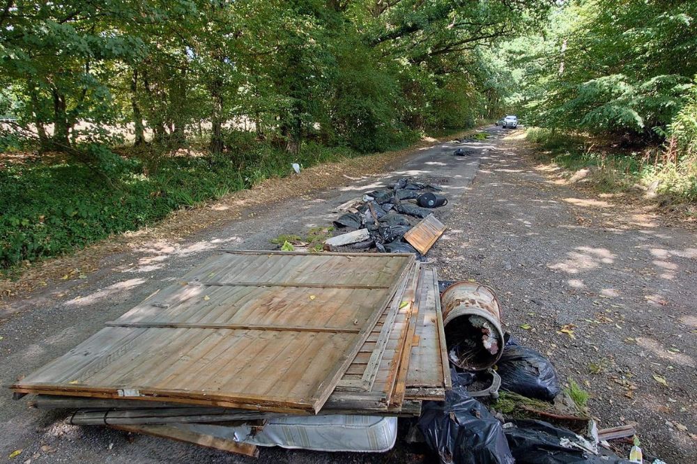 Fly tipped rubbish in Rusper countryside