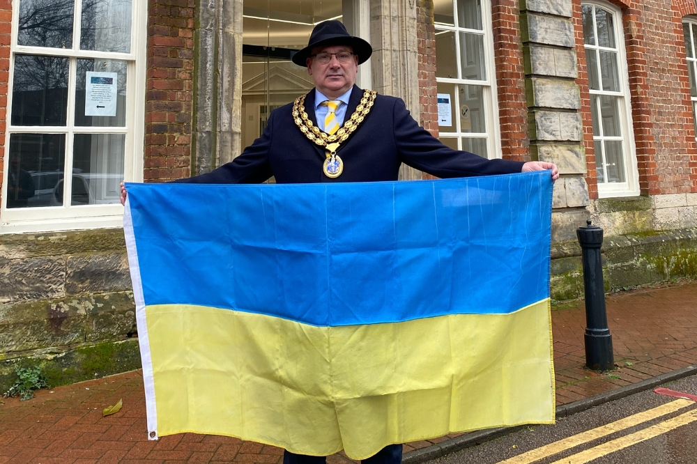 Cllr Emery with the Ukrainian flag