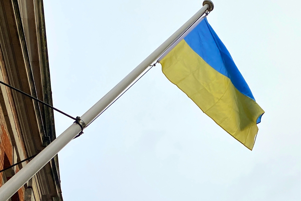 Blue and yellow Ukrainian flag flying at Park House in Horsham