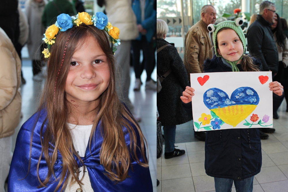 Young attendees at The Capitol with flags, national colours and artworks