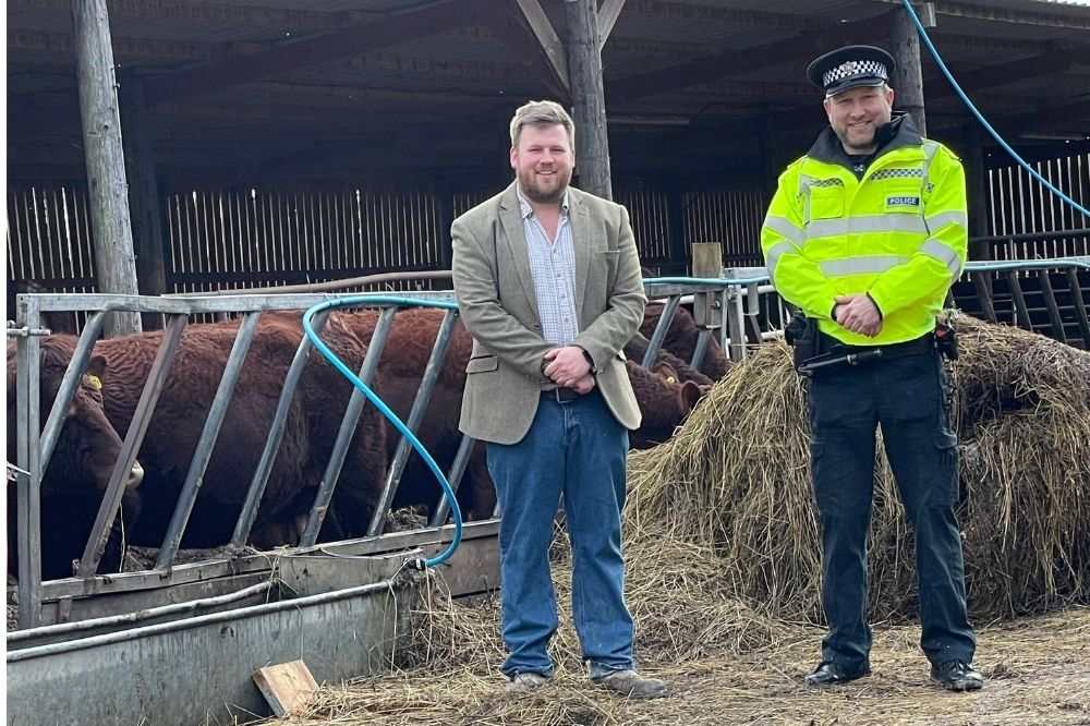 Rural Policing Inspector Oliver Fisher with Cllr James Wright
