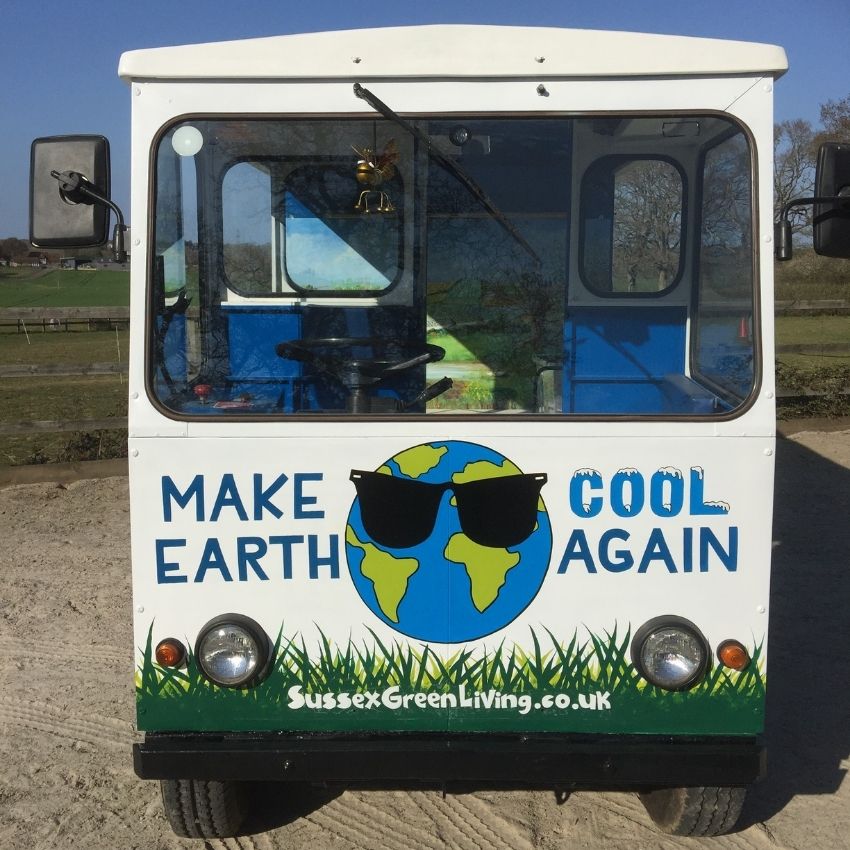 The front of the Eco station has the words Make Earth Cool Again on it and a globe wearing sunglasses