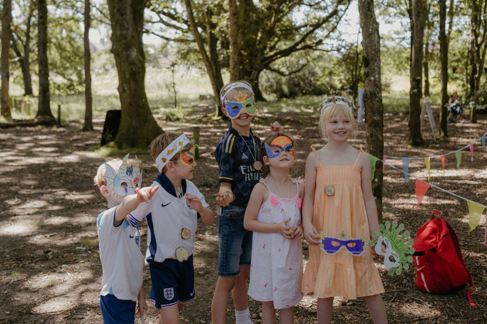 Children wearing handmade masks: Flora Westbrook photography