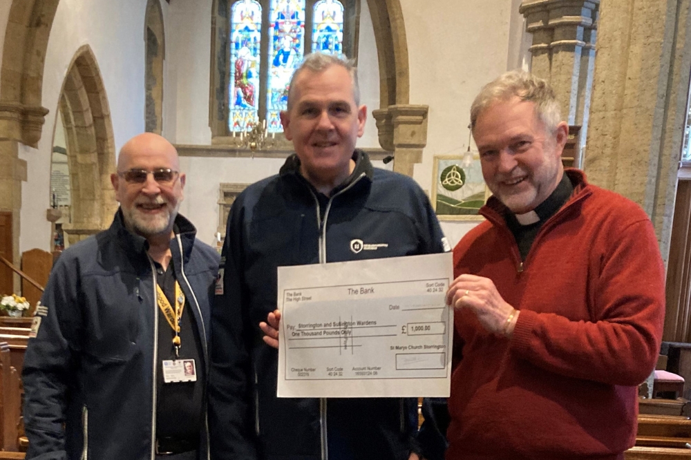 Storrington & Sullington Wardens at St Mary's Church receiving the donation from Revd. Jonathan Swindells