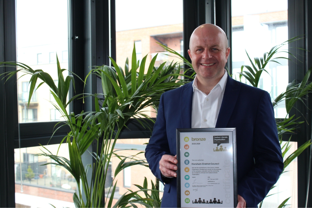 Horsham District Council Director of Communities Paul Anderson with the bronze carbon literacy certificate