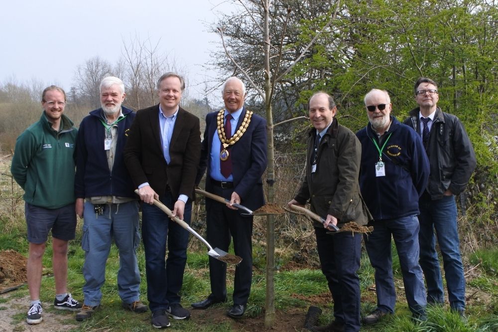 Cllr Christian Mitchell, Cllr David Skipp and Cllr Roger Noel with Friends of Warnham Local Nature Reserve and the Council's Parks and Countryside team plant a chestnut tree to mark the bicentenary of Shelley's death.